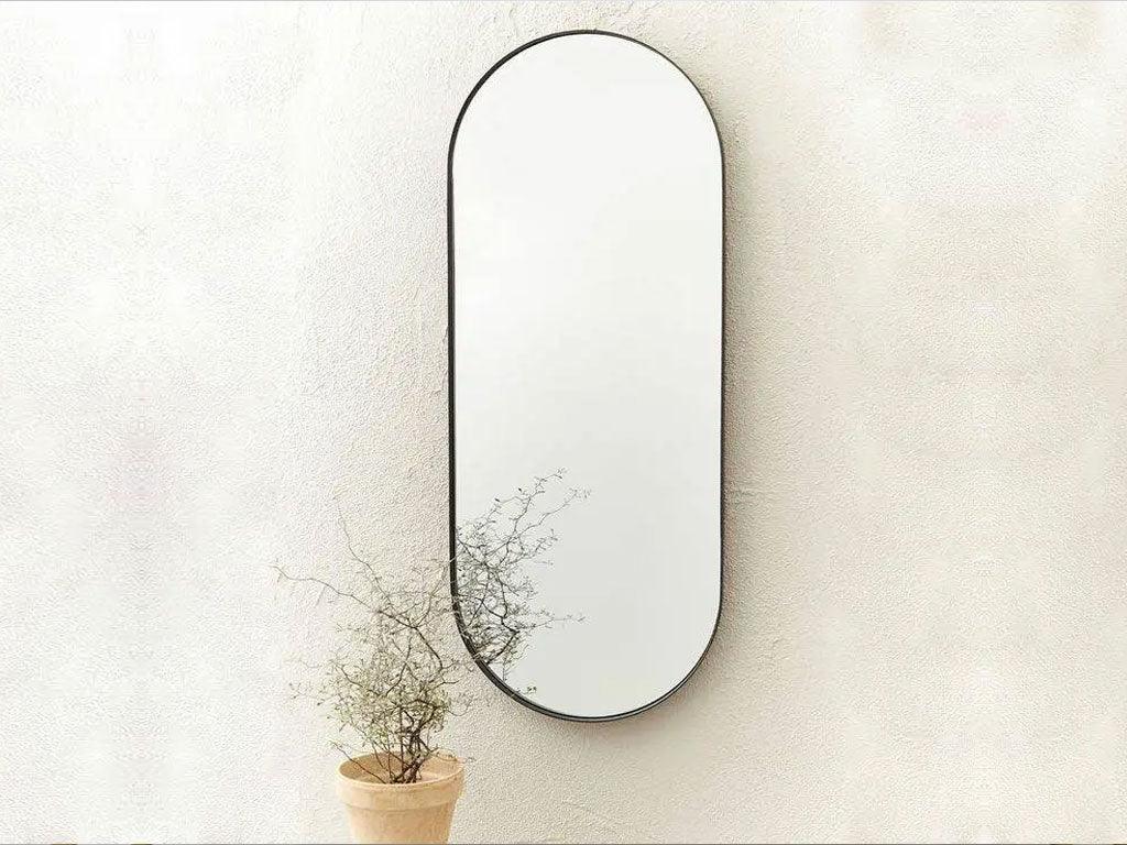 Miroir décoratif ovale  - cadre en métal doré
