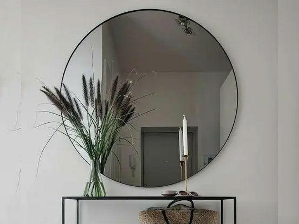Miroir décoratif rond - cadre en métal noir